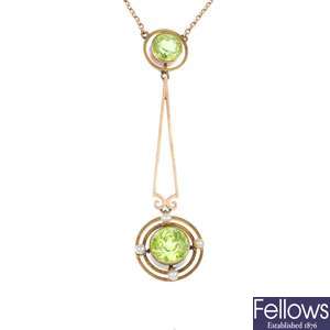 An early 20th century 9ct gold peridot and seed pearl pendant.