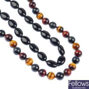 Five gemstone bead necklaces and a bracelet.