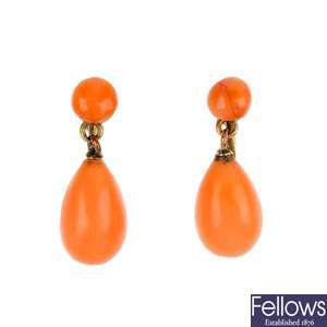 A pair of early 20th century 9ct gold coral ear pendants.
