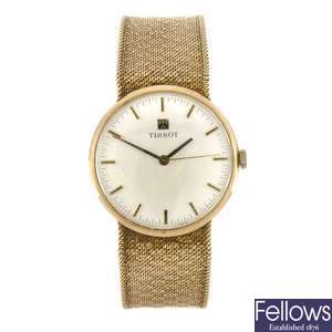(605010467) A 9ct gold manual wind gentleman's Tissot bracelet watch.