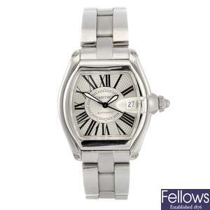 (1011025040) A stainless steel automatic gentleman's Cartier Roadster bracelet watch.