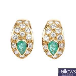 A pair of emerald and diamond ear clips. 