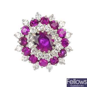 A 1980s 18ct gold ruby and diamond cluster ring.