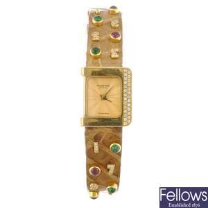 (118857-3-A) An 18k gold quartz lady's Roberge wrist watch.