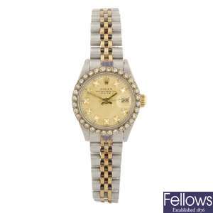 (528368-1-A) A bi-metal automatic lady's Rolex Date bracelet watch.