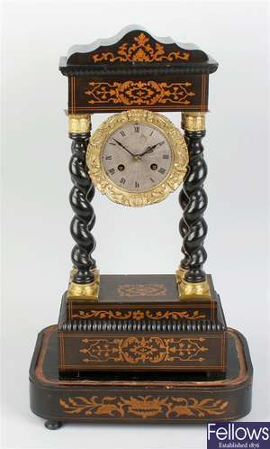 A late 19th century French inlaid portico clock