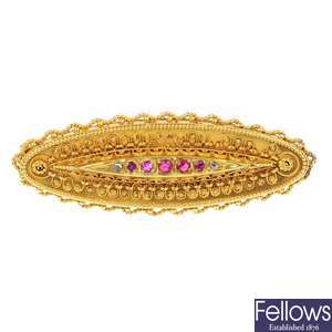 A late 19th century continental gold diamond, ruby and paste brooch.