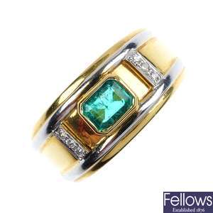 An 18ct gold emerald and diamond band ring.