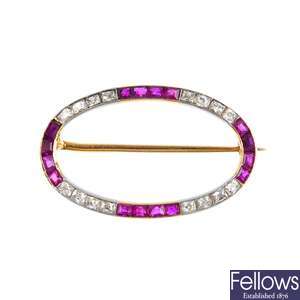 LA CLOCHE FRES - an early 20th century 18ct gold ruby and diamond brooch.