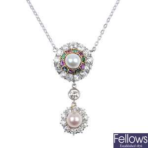A diamond, pearl and gem-set pendant.