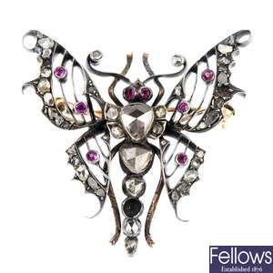 A late 19th century continental gold and silver gem-set moth brooch. 