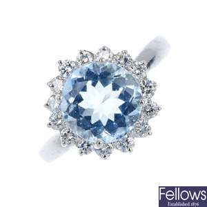 A aquamarine and diamond cluster ring.