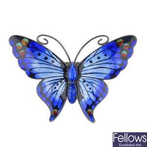 Two enamel butterfly brooches, a Charles horner enamel pendant, a butterfly wing pendant and a brooc
