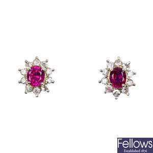 A pair of ruby and diamond cluster ear studs.