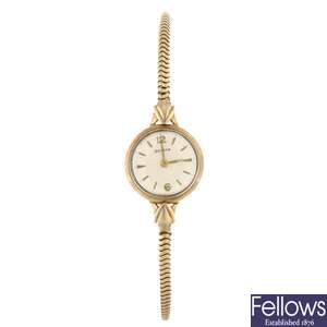 (303093997) A 9ct gold manual wind lady's Helvetia bracelet watch.