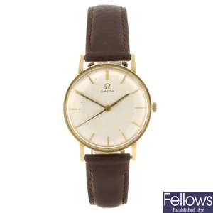 An 18k gold manual wind gentleman's Omega wrist watch.