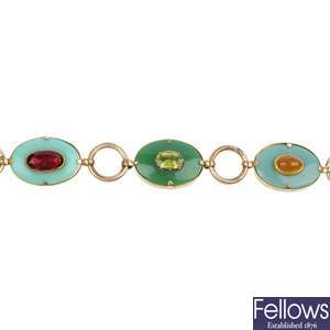 An early 20th century gold plated paste and gem-set bracelet.