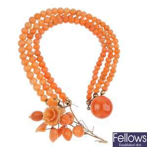 A late 19th century gold coral three-strand bracelet.