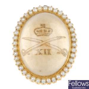 A late 19th century 15ct gold rock crystal and split pearl panel.