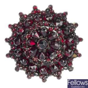 A mid 19th century garnet and paste brooch.