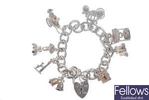 A selection of silver and white metal jewellery to include a charm bracelet.
