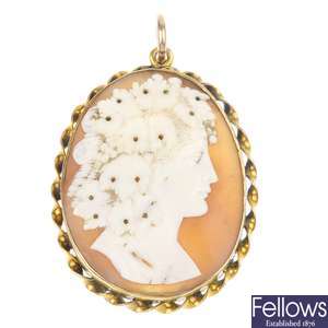 A shell cameo brooch and two 9ct gold shell cameo brooches.