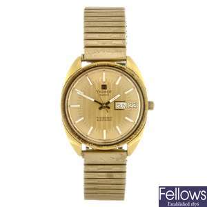 A gold plated electronic gentleman's Tissot bracelet watch and two Avia wrist watches.
