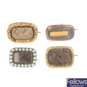 A selection of four Victorian mourning brooches, circa 1880. 