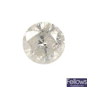 A brilliant-cut diamond, weighing 0.69ct.