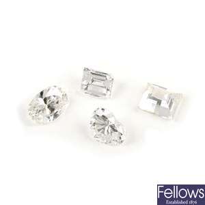 Four vari-cut diamonds.