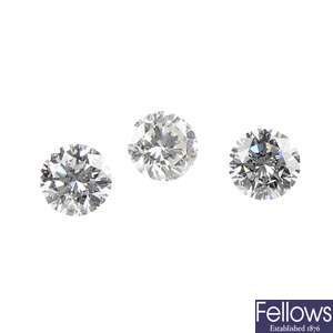 Three brilliant-cut diamonds.