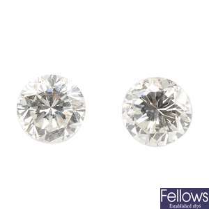 Two brilliant-cut diamonds, weighing 0.37 and 0.34ct.