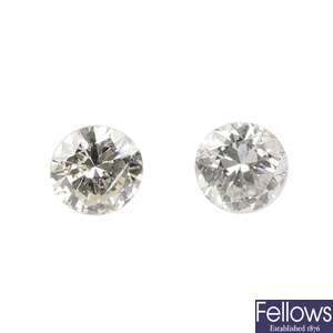Two brilliant-cut diamonds, weighing 0.29 and 0.28ct.