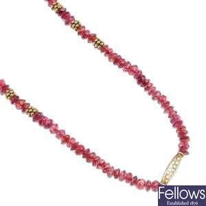 A garnet bead necklace and a paste bracelet.