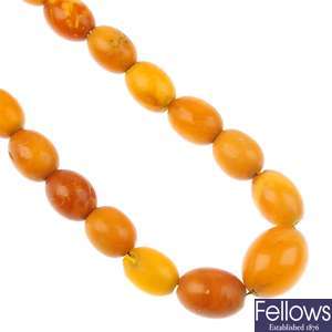 A selection of amber, reconstituted amber and compressed amber jewellery.