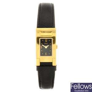 A gold plated quartz lady's Versace wrist watch.