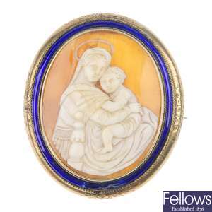 Two late 19th century shell cameo brooches and a jet brooch.