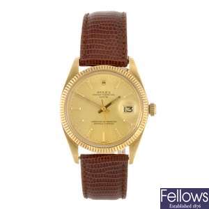 An 18k gold automatic gentleman's Rolex Oyster Perpetual Date wrist watch.