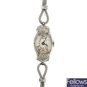 A lady's early 20th century platinum continental diamond cocktail watch. 