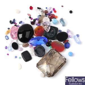 A quantity of mixed gemstones and paste.  