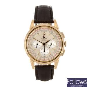 An 18k gold automatic chronograph gentleman's Omega Racend Timer wrist watch.
