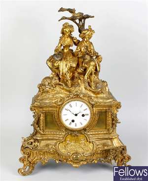 A 19th century gilt spelter cased mantle clock