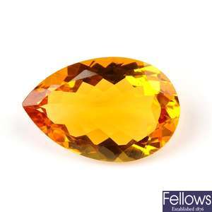 A pear-shape citrine, weighing 49.64cts.