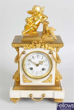 A late 19th century French marble, brass and ormolu mantel clock