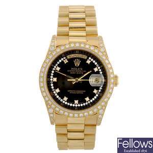 An 18k gold automatic gentleman's Rolex Day Date bracelet watch.