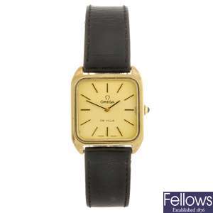 A gold plated manual wind lady's Omega De Ville wrist watch.