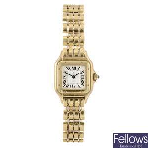 (311124790) A 14k gold quartz lady's Arpas bracelet watch.
