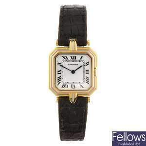 An 18k gold quartz Cartier Ceinture wrist watch.