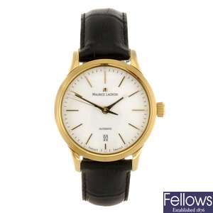 A gold plated automatic gentleman's Maurice Lacroix wrist watch with another Maurice Lacroix watch.
