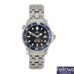 A stainless steel quartz mid-size Omega Seamaster Professional bracelet watch.